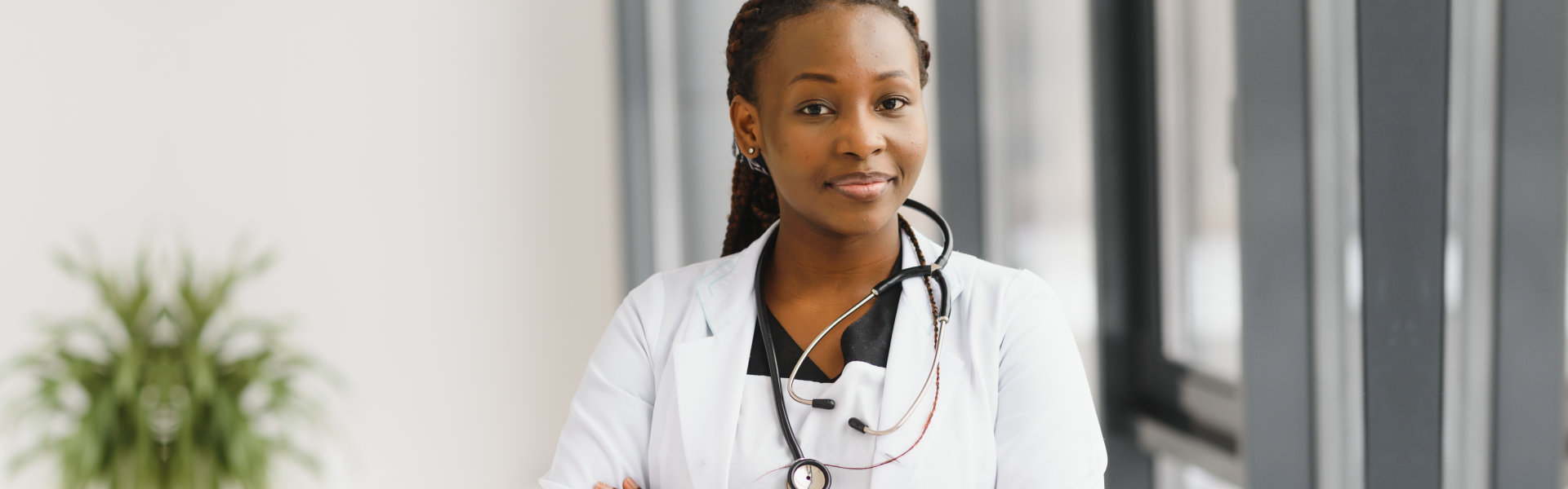 beautiful african american nurse with arms folded