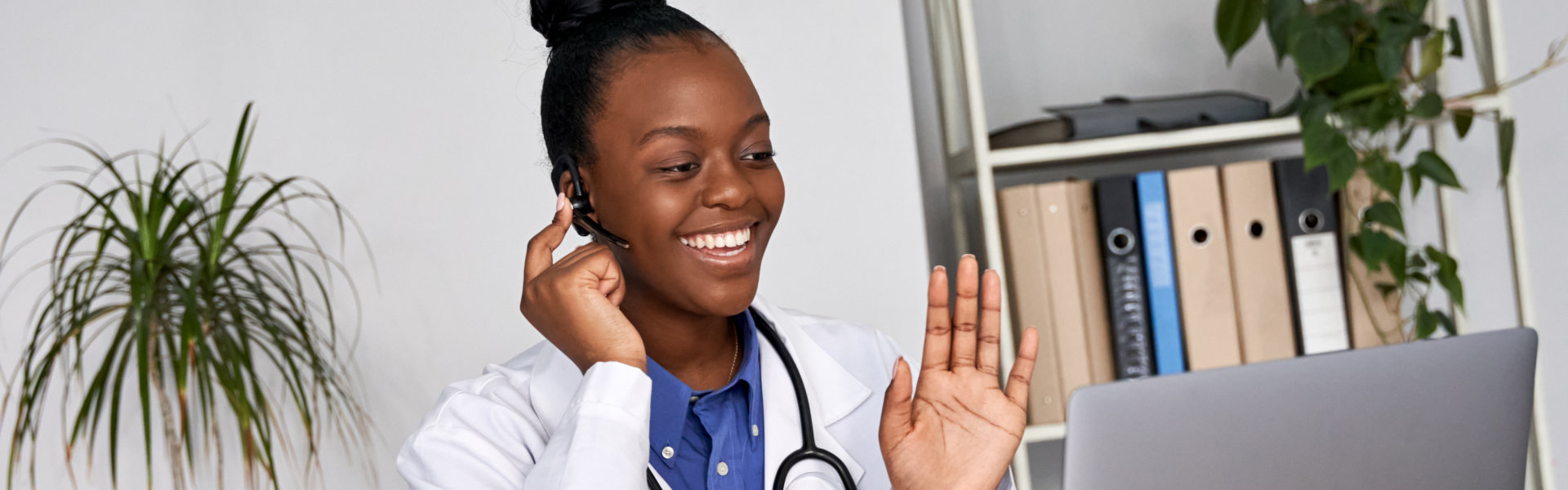 African female doctor consulting patient make online webcam